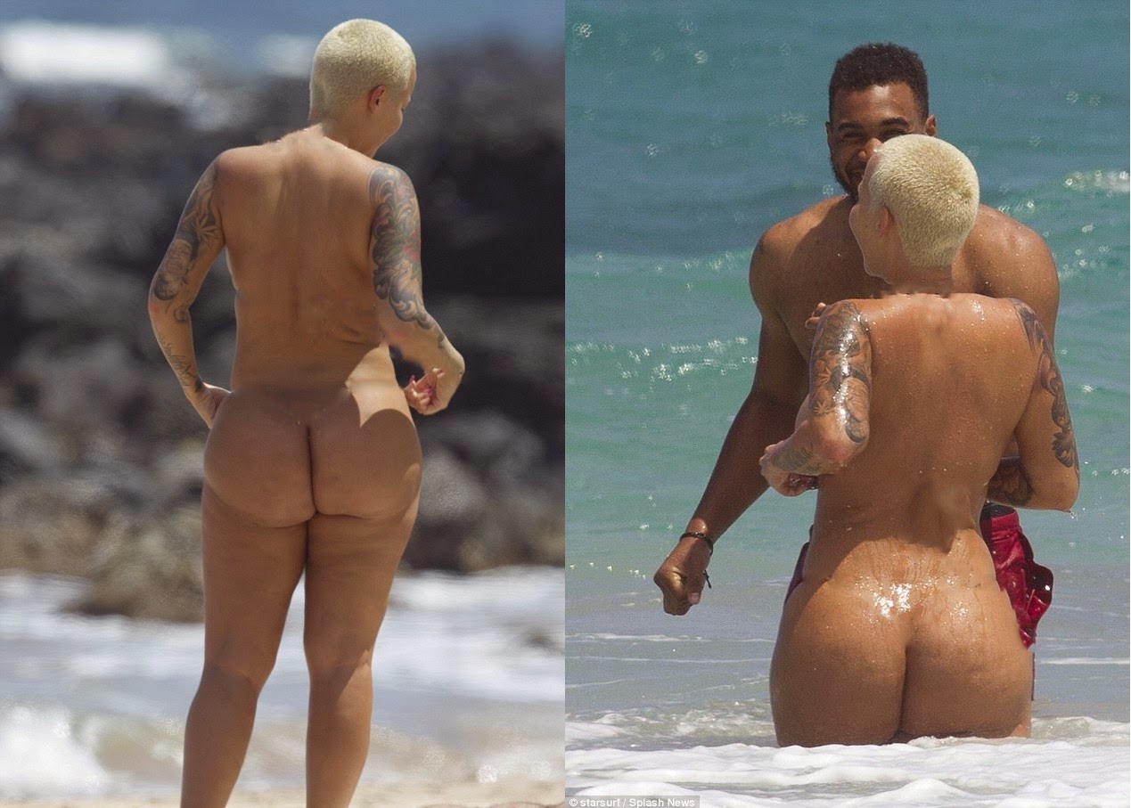 Amber Rose Goes Completely Top-Less as She Enjoys Beach Time