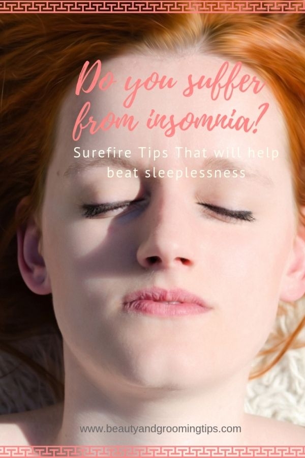 woman sleeping with a frown on face