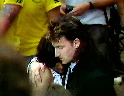 The lucky fan Bono pulled from the crowd in front of the stage at Live Aid July 13, 1985. Her name was Kal Khalique The lucky fan Bono pulled from the crowd in front of the stage at Live Aid July 13, 1985. Her name was Kal Khalique