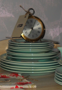 French Bradley clock sitting on top of Luray Surf Green China