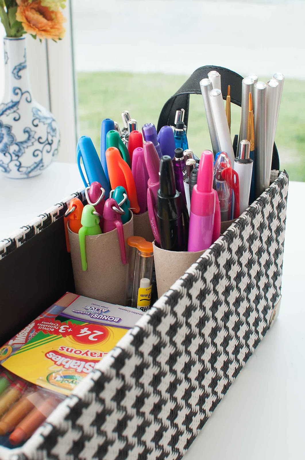 Use a gift wrap cardboard tube to organize markers and pens for a home office, craft room or playroom. Use a gift wrap cardboard tube to organize markers and pens for a home office, craft room or playroom.