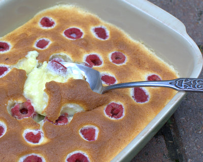 Lemon Pudding Cake ♥ KitchenParade.com, the old-fashioned lemon dessert, lemon cake on top and lemon pudding on the bottom, now with raspberries.