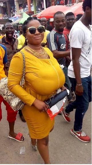 End Time Boobs! Woman with a Very Huge Chest Causes Commotion in Lagos (Photos)
