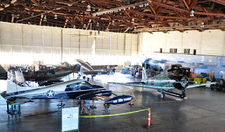 CAF planes WWII planes inside an airplane hangar