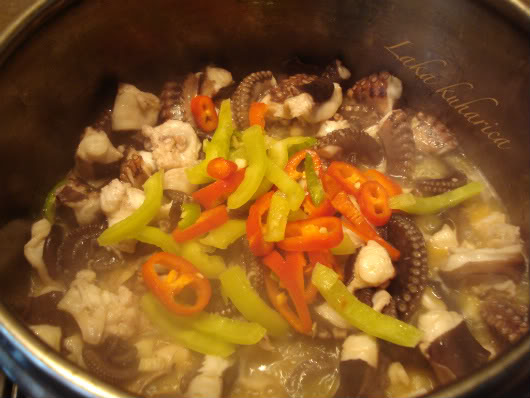 cooking octopus with garlic, chili and wine
