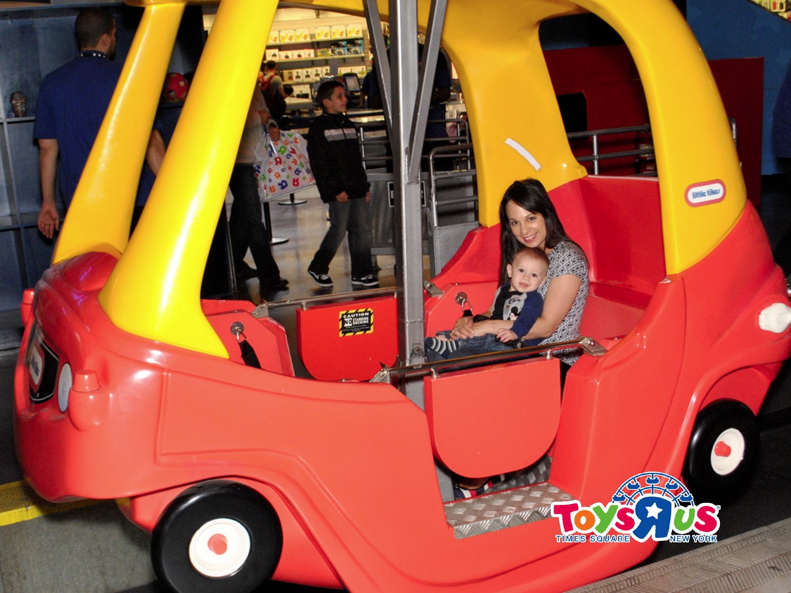 Phoenix's Baby Book Club Riding the Ferris Wheel at Toys R Us and
