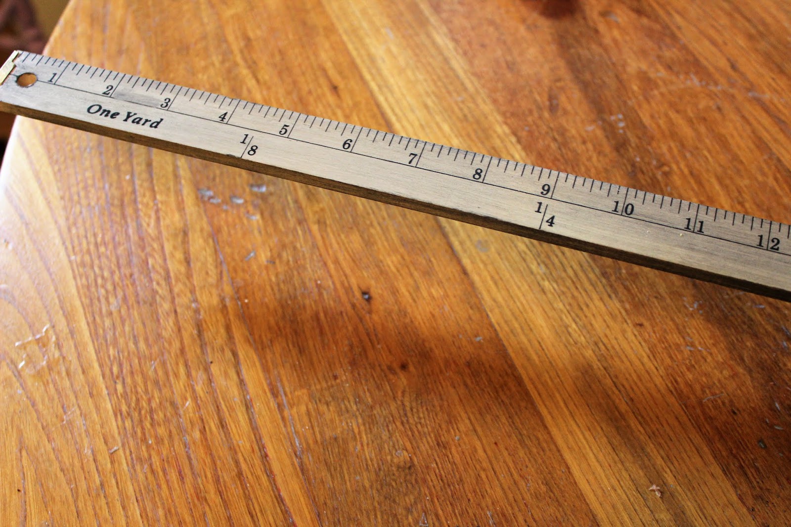 Easy Upcycled and Repurposed Yardstick Photo Displays Organized Clutter