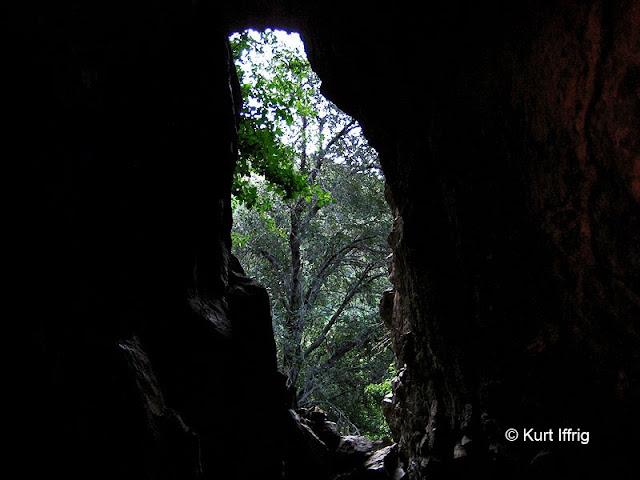 This narrow slot portal leads to a low ceiling inside. The mine's depty is about 60 feet. This mine is about 60 feet deep. At the end it bends left, with animal bones strewn about.