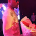 Ex Big Brother House Mate Ike waits for Finalist Mercy with Bunch of Roses