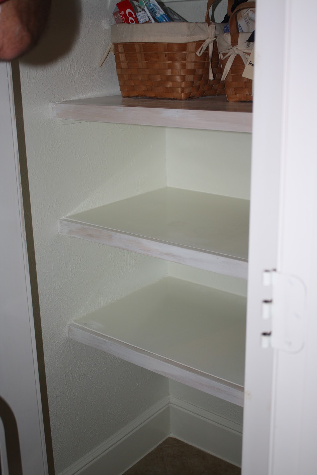 the little cottage on the pond... Turning a closet into open shelving...
