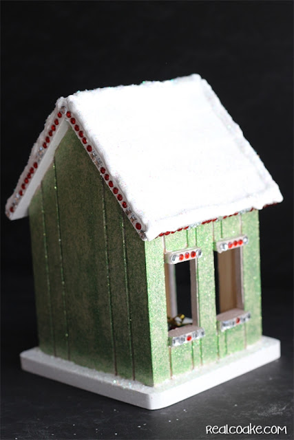 A DIY Christmas Craft to make a cute wood Gingerbread House from realcoake.com