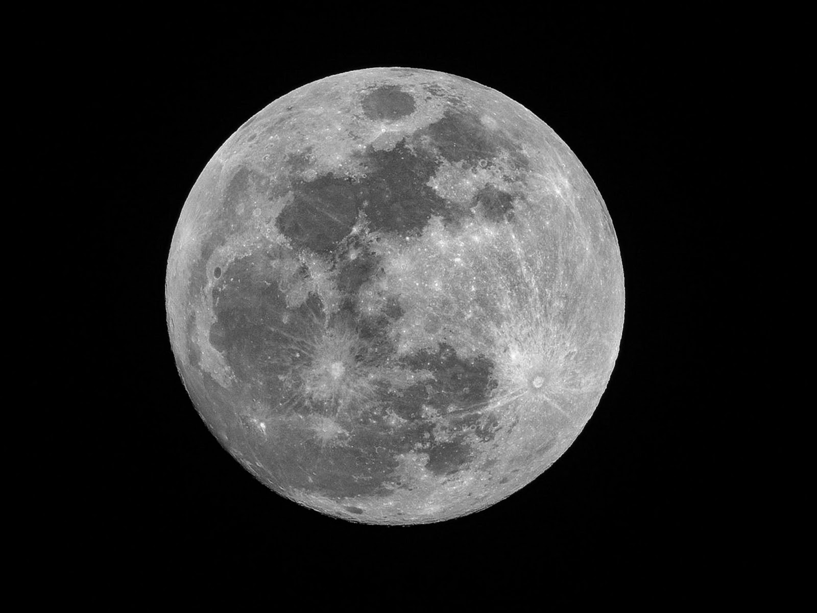 Close up photo of the moon, but with a pitch black background