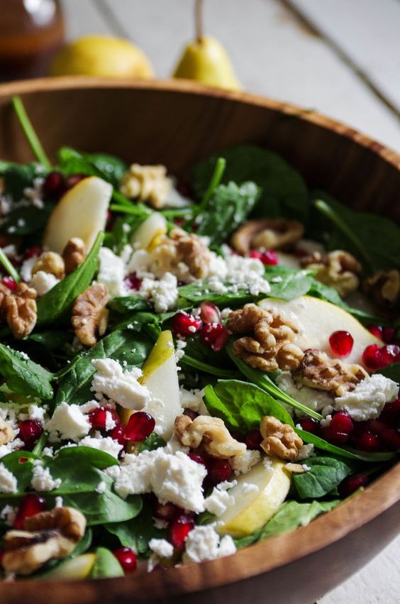Spinach pear and feta salad with walnuts and pomegranate arils Easy Recipes for Every Meal