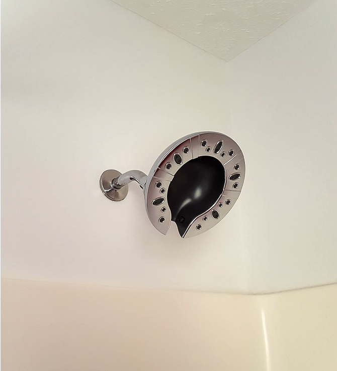 How to Swap out a Showerhead (and Delta ShowerHead Giveaway) DIY