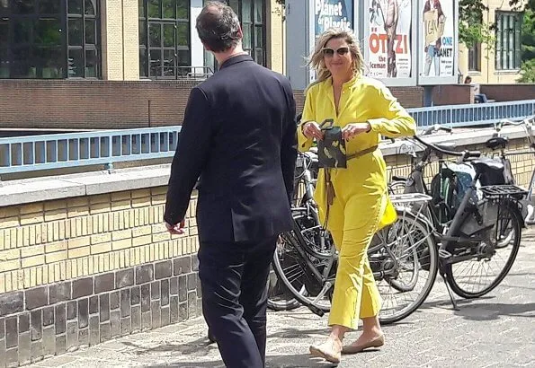 Queen Maxima wore Max Mara yellow blouse and trousers, Giuseppe Zanotti flat ballerinas. Sophie Habsburg Moneypenny watersnake clutch