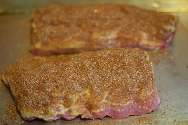 The spice rub on the top of the baby back ribs. 