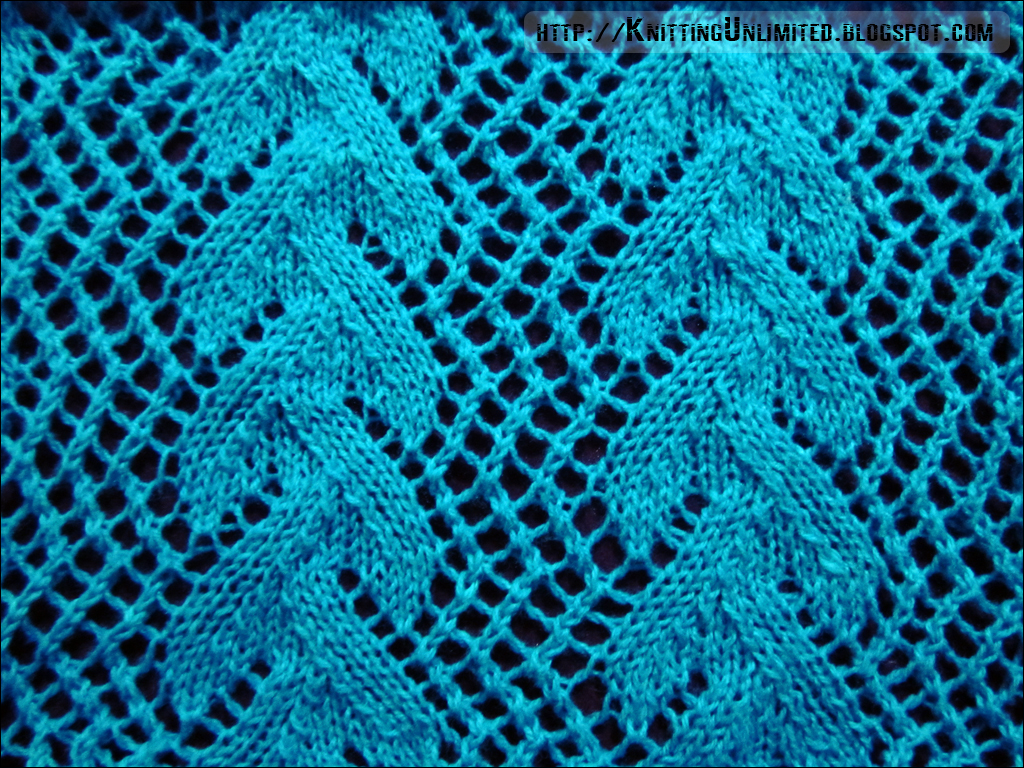 Stockingnet lace pattern with a vertical vine motif separated by zigzagging eyelet trellises.  http://knittingunlimited.blogspot.com