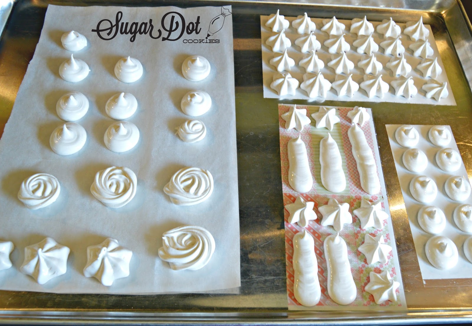 Bake the meringues. Peel them from the design sheets. The designs are