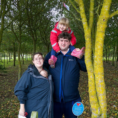 Louise, Michael, Sophie and Thomas at the Little Hearts Matter tree in the National Memorial Arboretum