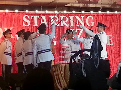 cake cutting with sword police theme