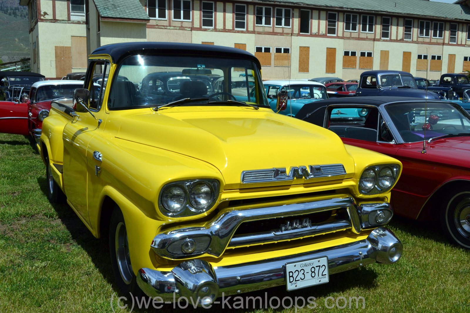 This bright yellow truck stands out in the crowd