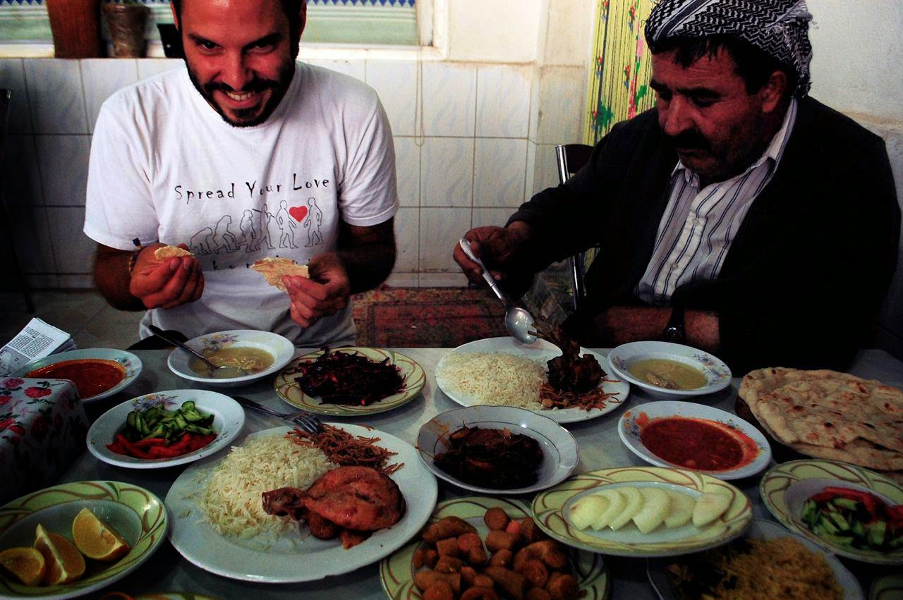 Chowing down in Kurdistan, a region of Iraq. - '1,000 Days of Summer': An Ex-Stock Broker Travels Around the World on $10 a Day Chowing down in Kurdistan, a region of Iraq. - '1,000 Days of Summer': An Ex-Stock Broker Travels Around the World on $10 a Day