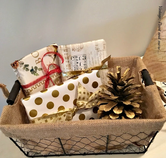 vintage wire basket with burlap liner and faux packages