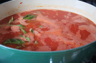 Tomato soup with sausage, spinach, and potatoes