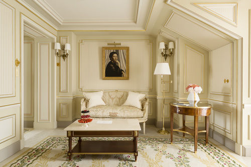 Take a tour of the renovated Ritz Paris Hotel Elegant cream and neutral guest suite with oil painting Ritz Paris