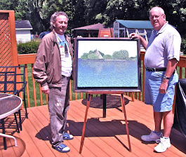 Supportive friend ,right,and myself with Cairn painting for fund raiser.