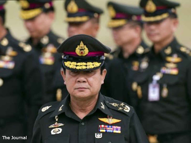 Thailand's Junta Eases Politics Ban in Step Toward Polls Thailand's Junta Eases Politics Ban in Step Toward Polls