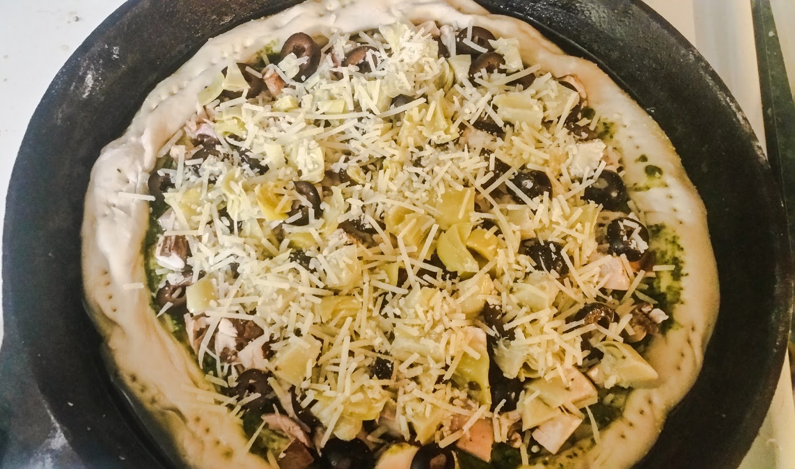 Kale Pesto & Chicken Artichoke Pizza with Pesto