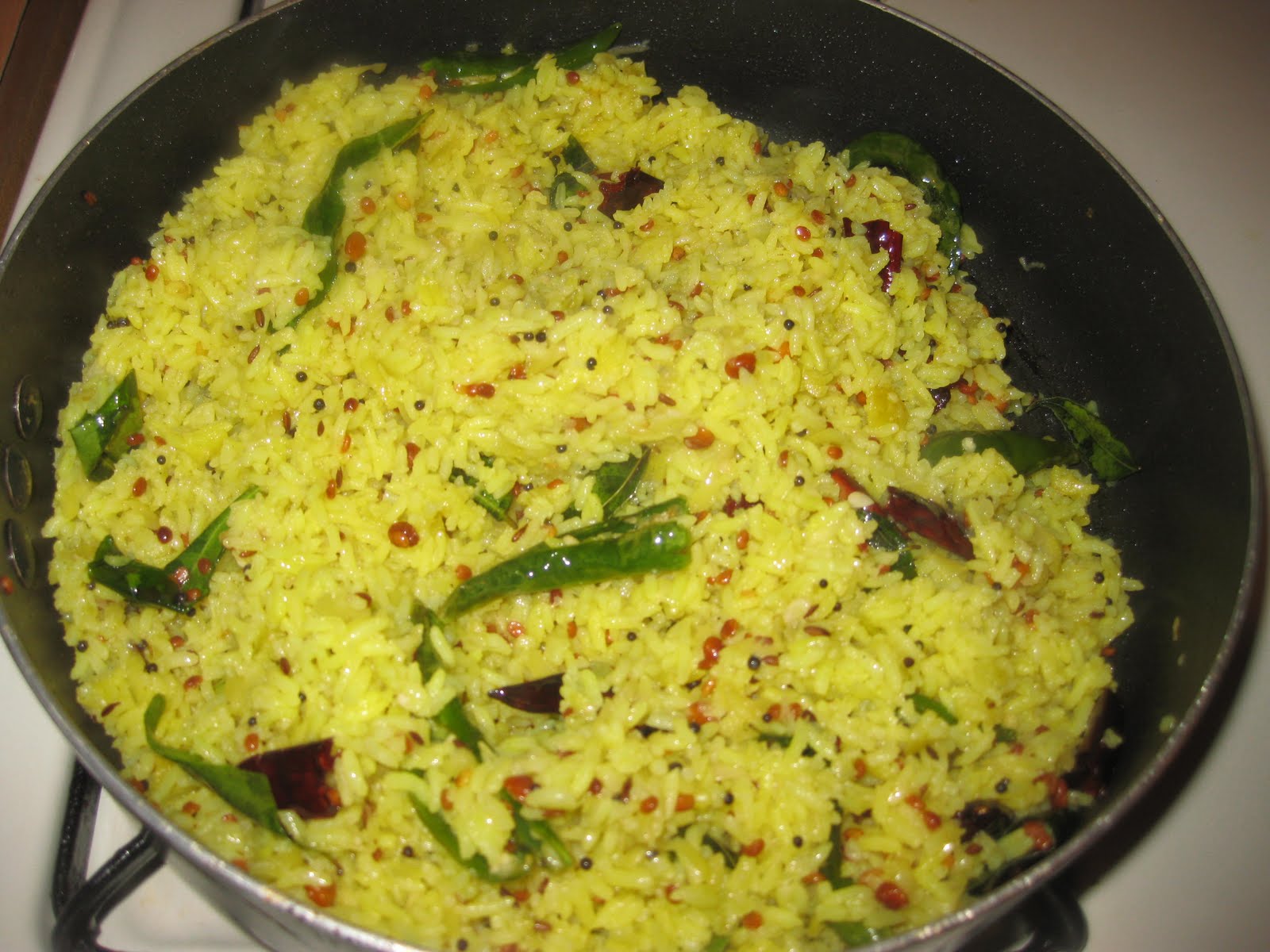Divya's Recipes: Mamidikaya Pulihora / Raw Mango Rice