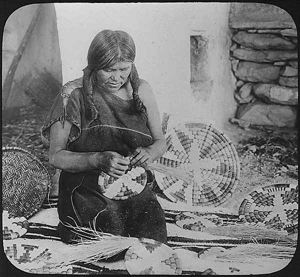 Image "Hopi woman weaving a basket, ca. 1900" courtesy of http://research.archives.gov/description/520083