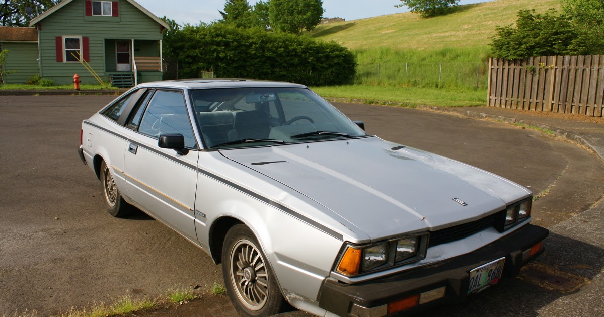 OLD PARKED CARS. 1980 Datsun 200SX.