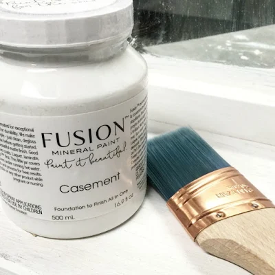 Fusion white paint and a brush