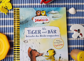 Ein Tag mit Tiger und Bär. Neue Geschichten aus der Figurenwelt von Janosch: "Als Tiger und Bär beinahe das Beste verpassten".