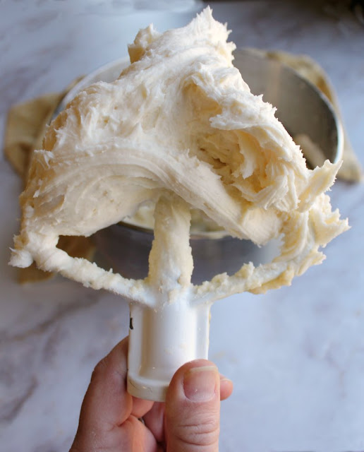 Beautiful frosting kissed with the flavors of honey and lemon. It is great for decorating and tastes amazing too! mixer paddle full of lemon honey buttercream