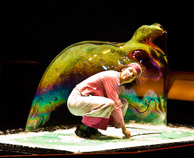 Man inside big rainbow soap bubble - Pep Bou Show
