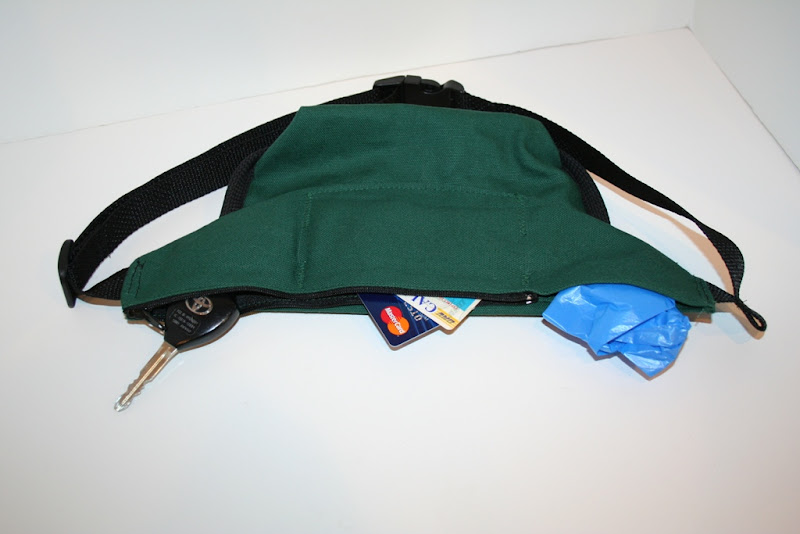 back panel pouches showing keys, credit cards and ID, and poop bag