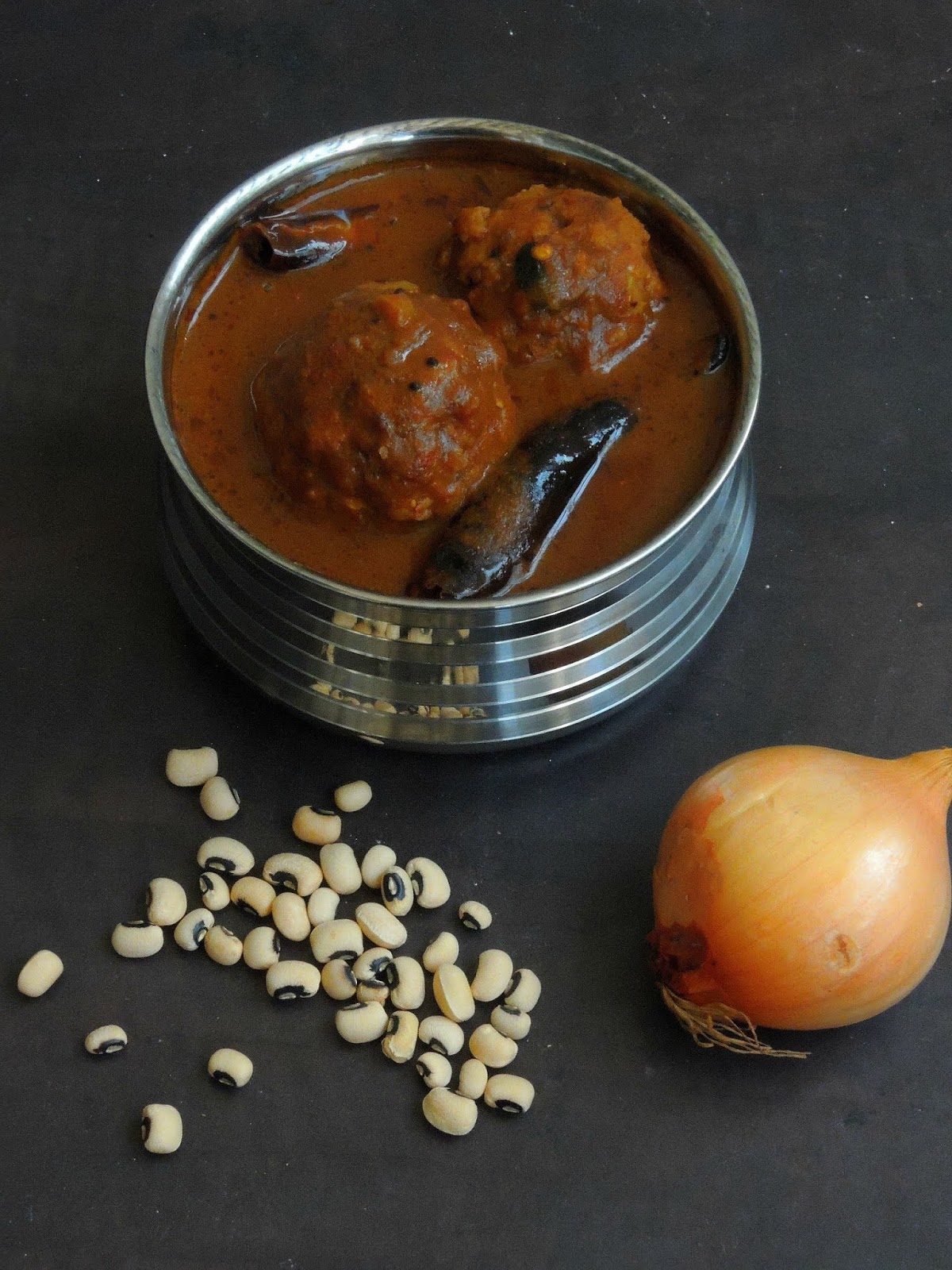 Priya's Versatile Recipes Blackeyed Peas Dumpling in Tangy Gravy/Kaaramani Urundai Kuzhambu