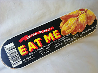 A box of dates labeled Eat Me