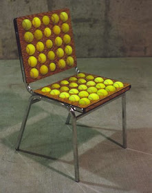 Sedia automassaggiante con le palline da tennis