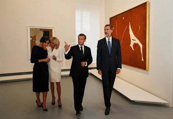 Queen Letizia wore DELPOZO flower embellished long sleeved dress. French President Emmanuel Macron and First Lady Brigitte Macron