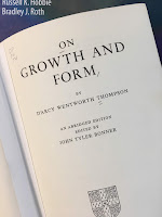 On Growth and Form, by D'Arcy Thompson, superimposed on Intermediate Physics for Medicine and Biology.