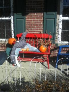 Allergy free scarecrow with pumpkin head and no straw.