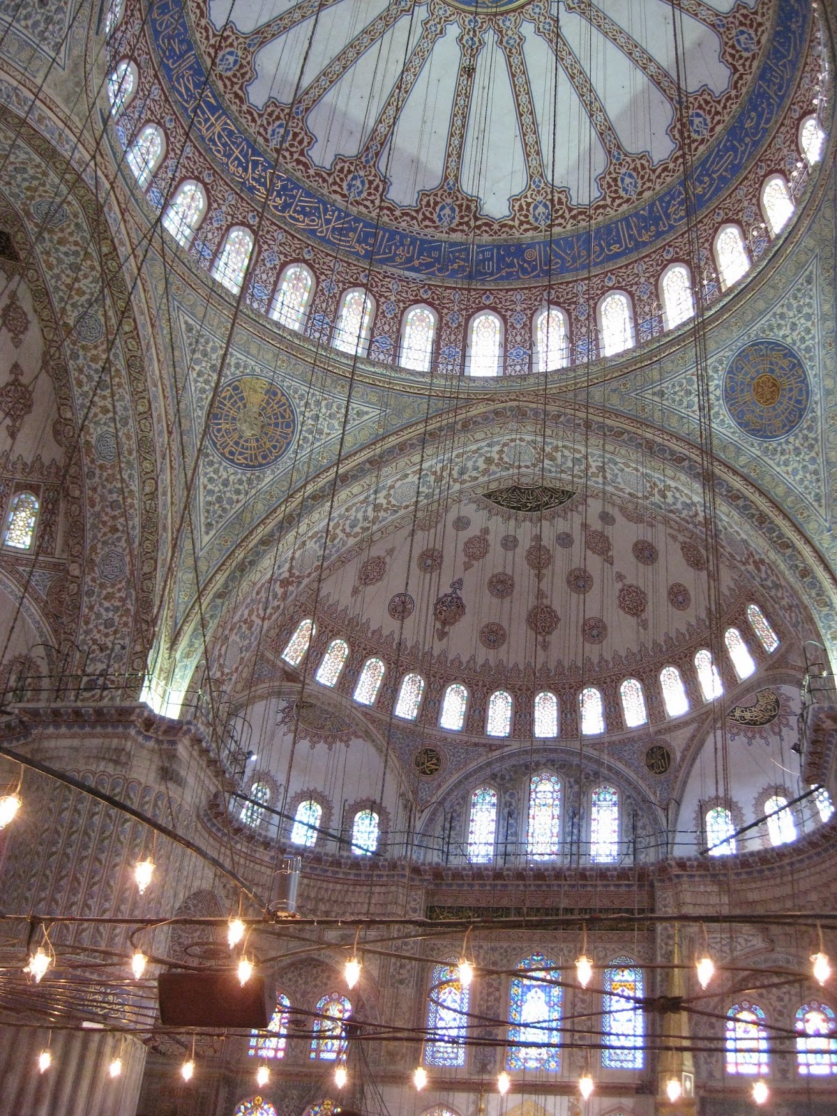 Istanbul - The ceiling and lights inside the Blue Mosque are amazing