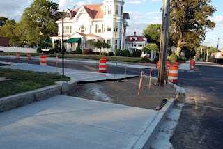 sidewalk work in progress on corner of Main and School Sts sidewalk work in progress on corner of Main and School Sts