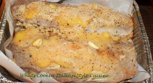 this is a pork tenderloin with cream of chicken soup over the top and stuffing inside