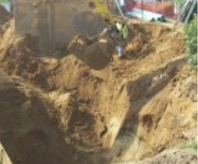 Unsupported foundation excavation in sandy soil